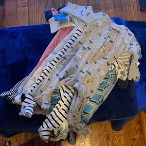 Footed onesies/pjs. Size 0-3months. Gerber and Carter’s brand. 10 piece at $2ea